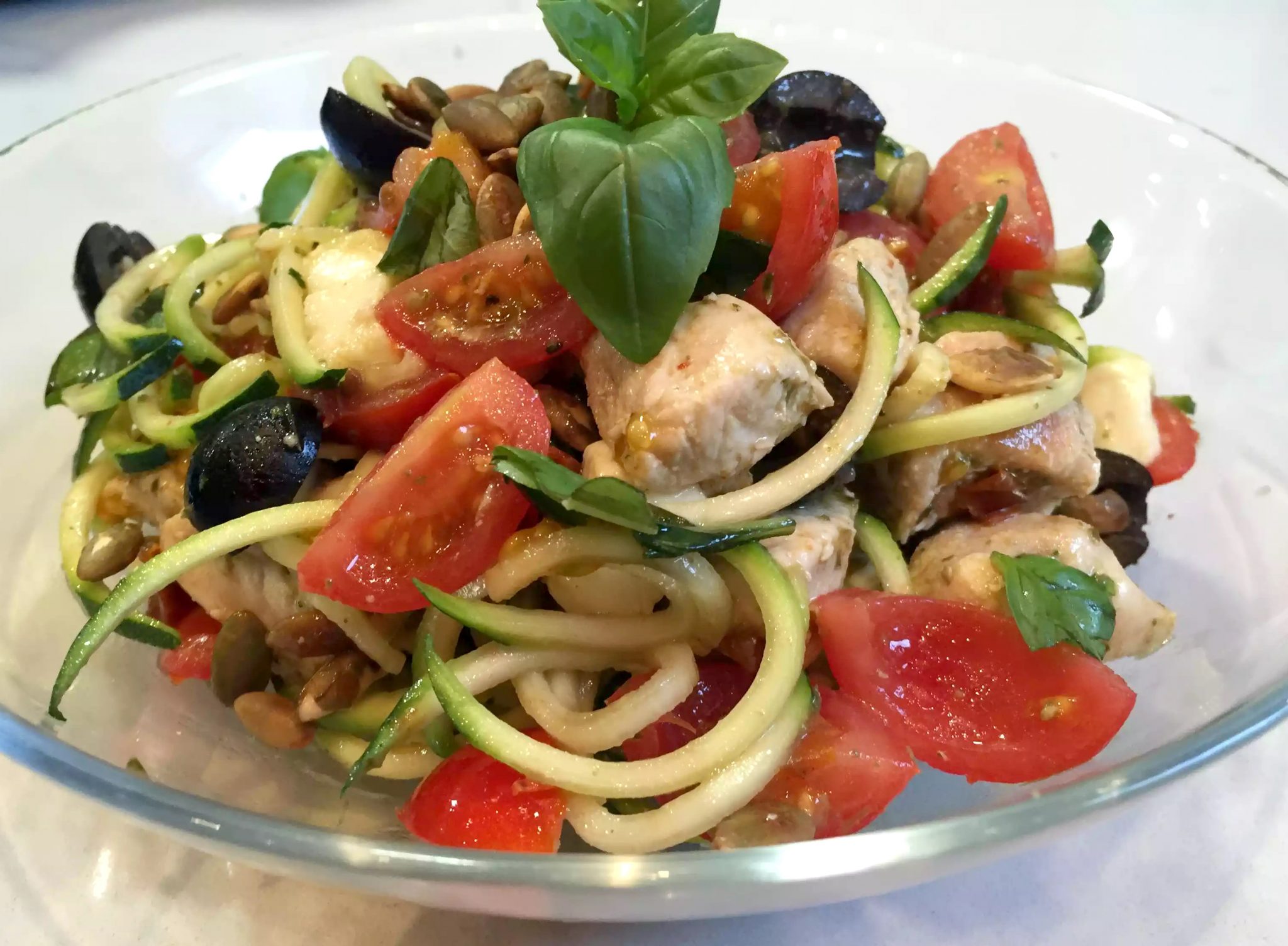 Caprese Chicken 'Pasta' Courgette Spaghetti Healthy Spiraliser Courgetti Spiralised Zucchini Mozzarella Tomatoes Cherry Sundried Olives Black Basil Pumpkin Seeds Italian SCD Paleo Clean Eating