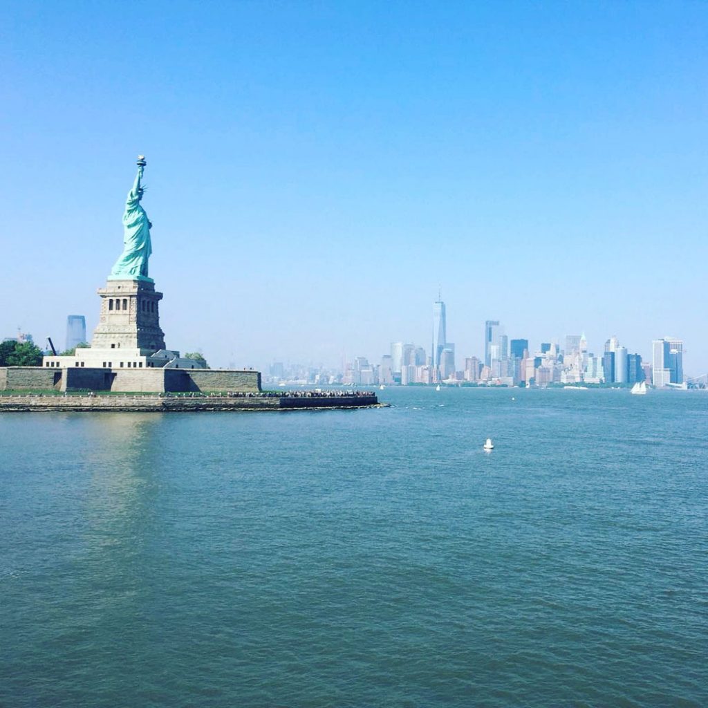 Statue of Liberty and New York Skyline by Emma Eats & Explores