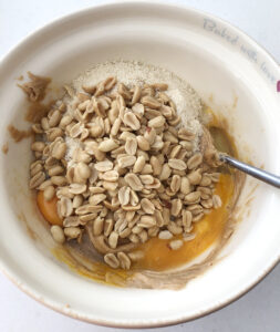 Ingredients for SCD Peanut Butter Cookies in a mixing bowl