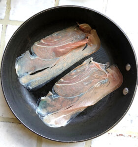Parma ham in frying pan