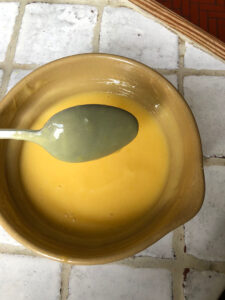 Lemon Curd coating the back of a spoon
