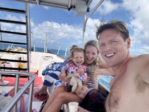 Family on glass bottomed boat in Barbados