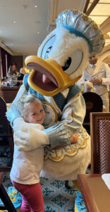 Nellie meeting Donald at the Royal Banquet at disneyland Paris
