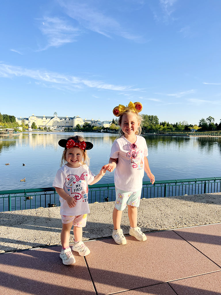Girls walking from the hotel to Disneyland Paris in their Mickey ears
