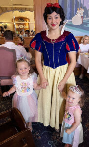 Girls meeting Snow White at Auberge de cendrillon Breakfast