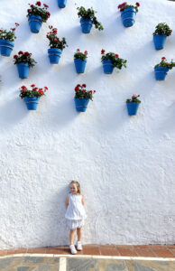 Lottie on Calle Carmen - bluepots and carnations
